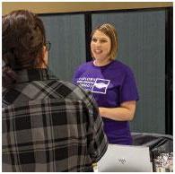 photo of Erica Mueller, dental front office supervisor, answering questions from a participant
